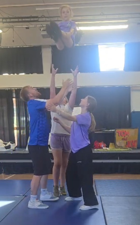 KSAL Athletics athletes celebrating after a routine